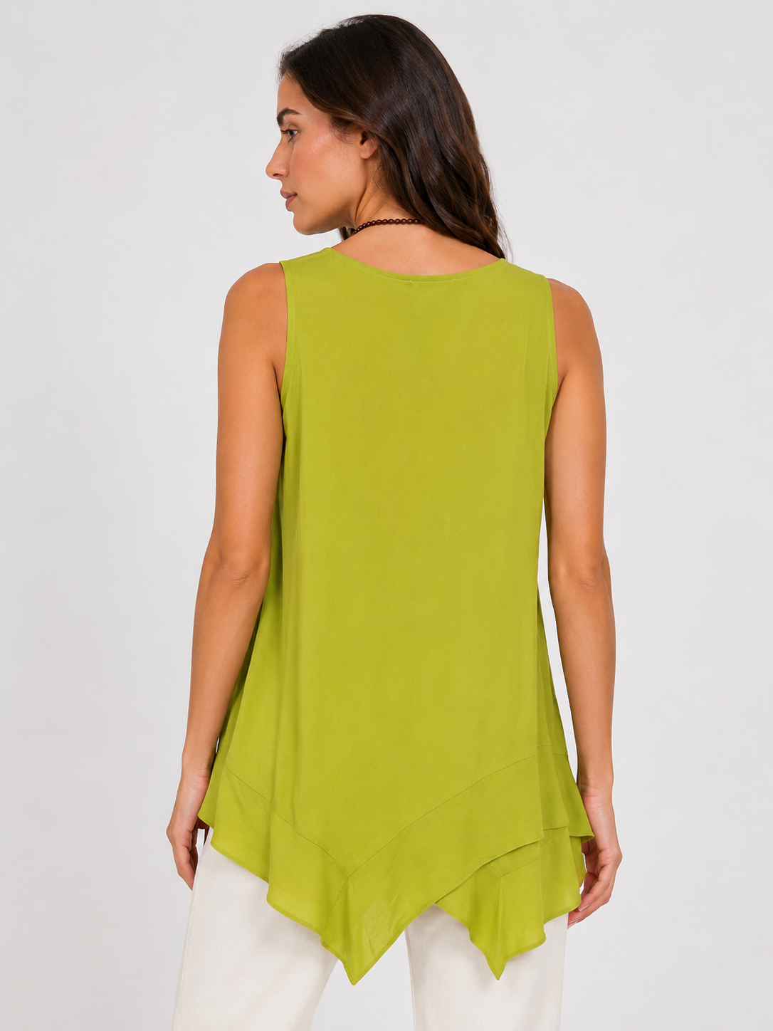 Top asimmetrico con collana Extasy